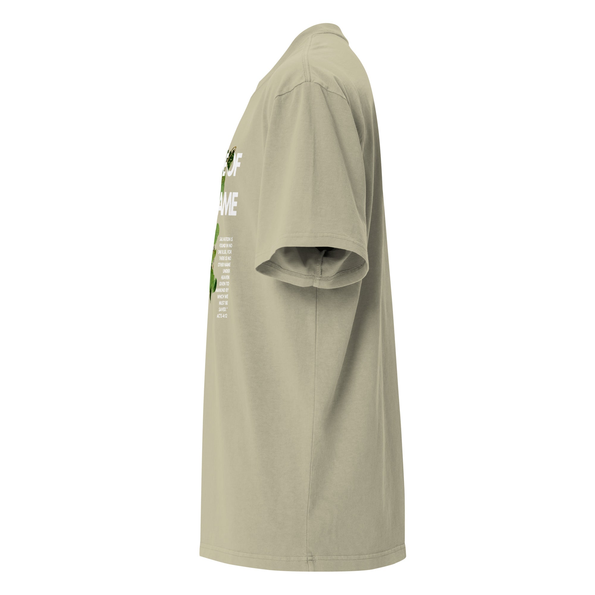 Side view of a eucalyptus green oversized tee showing the vertical front graphic and relaxed fit. Faith-based message with vine artwork partially visible from side angle.