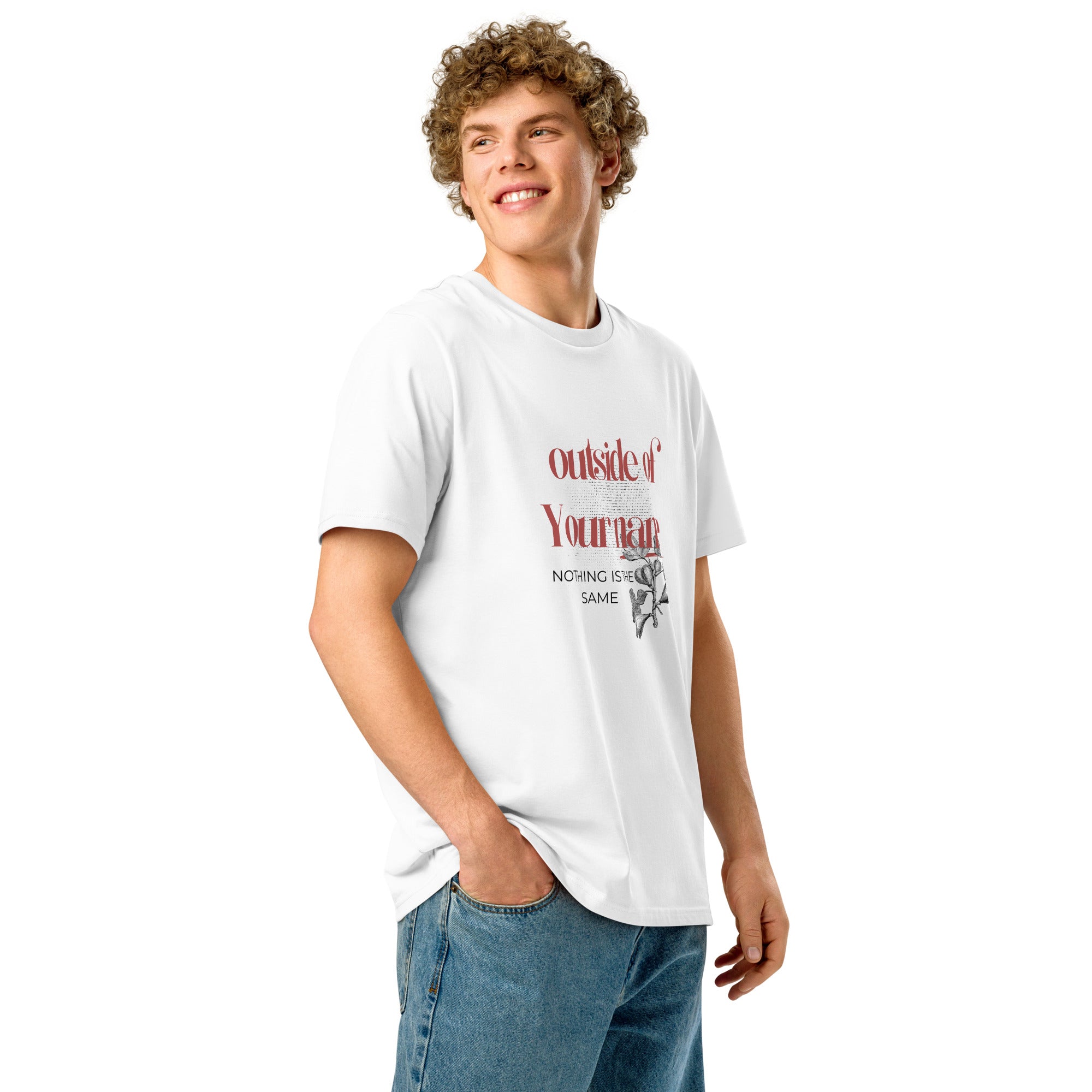 Young man smiling in white 'Outside of Your Name' tee – Christian statement shirt with red distressed lettering and fig branch graphic – Influence View