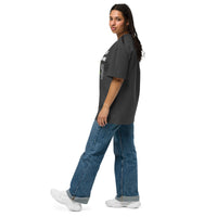 Woman walking in black 'Outside of Your Name' Christian T-shirt – relaxed oversized fit with bold scripture and fig vine artwork – Influence View