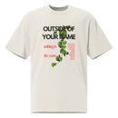 Flat lay of cream 'Outside of Your Name' oversized Christian tee – bold red and green fig vine artwork with scripture-inspired message – Influence View