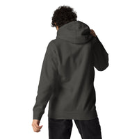 Back view of a person wearing a solid vintage black hoodie with no design on the back. Classic fit with dropped shoulders and a relaxed silhouette.