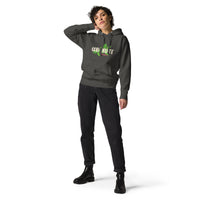 Person wearing a vintage black Christian hoodie with bold “God Did It” graphic in distressed white and green lettering. Features vine artwork and red “Genesis 50:20” scripture reference.